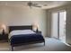 The bedroom features carpet, ceiling fan, recessed lighting, and a private balcony at 6144 S Fairway Pl, Gold Canyon, AZ 85118