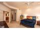 Spacious main bedroom with carpet, ceiling fan, and ensuite bathroom at 6144 S Fairway Pl, Gold Canyon, AZ 85118