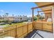 Relaxing balcony view overlooking lush landscaping and neighborhood creating a private retreat at 6928 E 3Rd St, Scottsdale, AZ 85251