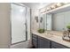 Bright bathroom with modern shower, vanity and ample lighting, offering a clean and functional space at 6928 E 3Rd St, Scottsdale, AZ 85251