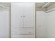 A classic white storage cabinet with drawers offers ample storage space at 6928 E 3Rd St, Scottsdale, AZ 85251