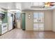 Functional kitchenette featuring ample cabinet space and convenient stacked washer and dryer at 6928 E 3Rd St, Scottsdale, AZ 85251