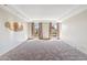 Bright living room boasts abundant natural light and neutral decor, providing a versatile living space at 6928 E 3Rd St, Scottsdale, AZ 85251