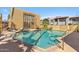 Refreshing community pool with ample seating and desert landscaping adding to the oasis at 6928 E 3Rd St, Scottsdale, AZ 85251