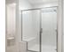 Bathroom featuring an all-white shower with glass enclosure and bench seat at 7433 W Buckhorn Trl, Peoria, AZ 85383