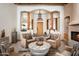 Spacious living room featuring natural wood beams, light colors and desert views at 8400 E Dixileta Dr # 153, Scottsdale, AZ 85266