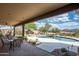 Relaxing pool patio with seating area, perfect for enjoying the outdoors and entertaining guests at 8400 E Dixileta Dr # 153, Scottsdale, AZ 85266