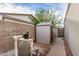 Backyard featuring a convenient storage shed, modern pool equipment, and a block wall for added privacy at 863 W Kiva Ave, Mesa, AZ 85210