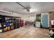 Spacious garage with ample storage, bike racks, and a work area at 863 W Kiva Ave, Mesa, AZ 85210