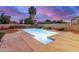 A refreshing pool with a spacious deck, perfect for relaxing or entertaining guests at 863 W Kiva Ave, Mesa, AZ 85210
