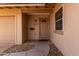 Inviting front entrance featuring a decorative door, stylish hardware, and a welcoming mat at 8637 E Weldon Ave, Scottsdale, AZ 85251