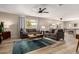 Inviting living room with modern furnishings, neutral decor, and abundant natural light at 8637 E Weldon Ave, Scottsdale, AZ 85251
