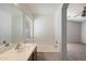 This bathroom features a shower-tub combo and a modern single sink vanity at 8708 S 50Th Ln, Laveen, AZ 85339