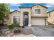 Charming two-story home with landscaped yard and two car garage at 8708 S 50Th Ln, Laveen, AZ 85339