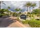 Gated community entrance with lush landscaping and clear signage, ensuring privacy and security at 8989 N Gainey Center Dr # 231, Scottsdale, AZ 85258