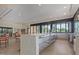 Spacious community room with stainless steel counter and tables at 8989 N Gainey Center Dr # 231, Scottsdale, AZ 85258