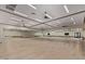 Spacious fitness studio features full wall mirrors, wood flooring, and plenty of room to exercise at 8989 N Gainey Center Dr # 231, Scottsdale, AZ 85258