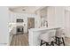 Modern kitchen with stainless steel appliances, breakfast bar, and sleek countertops at 8989 N Gainey Center Dr # 231, Scottsdale, AZ 85258