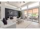 Bright living room with modern decor and a sliding glass door to a patio at 8989 N Gainey Center Dr # 231, Scottsdale, AZ 85258