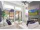 Bright living room with modern fireplace, large windows, and access to outdoor seating at 8989 N Gainey Center Dr # 231, Scottsdale, AZ 85258