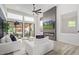 Bright and open living room with a modern fireplace and access to a beautiful outdoor area at 8989 N Gainey Center Dr # 231, Scottsdale, AZ 85258