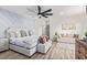 Luxurious main bedroom featuring a king-size bed, seating area, and stylish decor at 8989 N Gainey Center Dr # 231, Scottsdale, AZ 85258