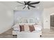Serene main bedroom with a decorative wall, plush bedding, and a spacious layout for ultimate relaxation at 8989 N Gainey Center Dr # 231, Scottsdale, AZ 85258