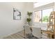 Bright office with modern desk, chairs, decor, and a large window at 8989 N Gainey Center Dr # 231, Scottsdale, AZ 85258
