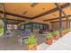 Expansive outdoor gathering area with stylish tables and chairs for residents' use at 8989 N Gainey Center Dr # 231, Scottsdale, AZ 85258