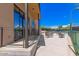 Outdoor patio features comfortable seating and a scenic view of pickleball court at 8989 N Gainey Center Dr # 231, Scottsdale, AZ 85258