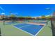 Community pickleball courts with nets in place ready for the next match at 8989 N Gainey Center Dr # 231, Scottsdale, AZ 85258