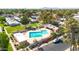 Community pool with lounge area and landscaping, a great place to relax and enjoy the sunshine at 903 N Revere St # F, Mesa, AZ 85201