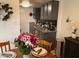 Charming kitchen with gray cabinets and dining table, great for entertaining at 948 S Alma School Rd # 115, Mesa, AZ 85210