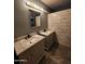 Bathroom featuring a dual vanity, stone countertops, and tile flooring at 11233 W Olive Dr, Avondale, AZ 85392