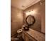 Bathroom featuring a bowl sink, granite countertops, and wooden style tiling at 11233 W Olive Dr, Avondale, AZ 85392