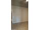 Bedroom with tile flooring and neutral paint at 11233 W Olive Dr, Avondale, AZ 85392