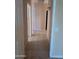 Hallway featuring tile flooring and neutral paint at 11233 W Olive Dr, Avondale, AZ 85392
