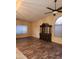 Living room featuring wood floors and a display cabinet at 11233 W Olive Dr, Avondale, AZ 85392