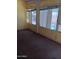 Bright sun room with large windows offering great light and views at 11233 W Olive Dr, Avondale, AZ 85392