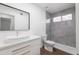 Modern bathroom features a tiled shower, stylish vanity and a vessel sink at 1150 E Tyson St, Chandler, AZ 85225