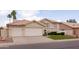 Charming two-story home featuring a well-manicured lawn and a spacious two-car garage at 1150 E Tyson St, Chandler, AZ 85225