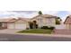 Charming two-story home featuring a well-manicured lawn and a spacious two-car garage at 1150 E Tyson St, Chandler, AZ 85225