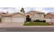Charming two-story home featuring a well-manicured lawn and a spacious two-car garage at 1150 E Tyson St, Chandler, AZ 85225