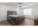 Bright primary bedroom featuring recessed lighting, wood-look flooring and an en-suite bath at 1150 E Tyson St, Chandler, AZ 85225