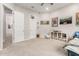 Charming bedroom with a ceiling fan, neutral walls, and kid-friendly superhero themed decor at 11818 W Luxton Ln, Avondale, AZ 85323