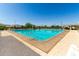Inviting community swimming pool with clean facilities and ample lounge seating for relaxing by the water at 11818 W Luxton Ln, Avondale, AZ 85323