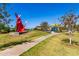 Beautiful community area featuring an artistic sculpture and playground at 11818 W Luxton Ln, Avondale, AZ 85323