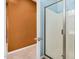 Bathroom featuring an open doorway and glass-enclosed shower at 15573 W Laurel Ln, Surprise, AZ 85379