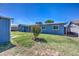 Backyard featuring large shade tree and patio at 1740 W Crescent Ave, Mesa, AZ 85202