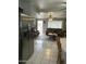 Comfortable living room with tile floors, ceiling fans, and lots of natural light at 1740 W Crescent Ave, Mesa, AZ 85202